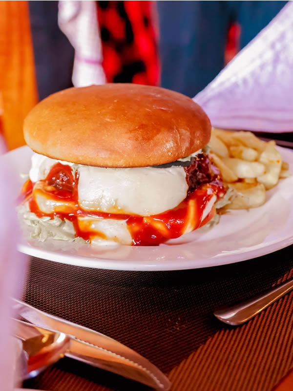 Gourmet burgers served at Penety Amboseli Resort dining area